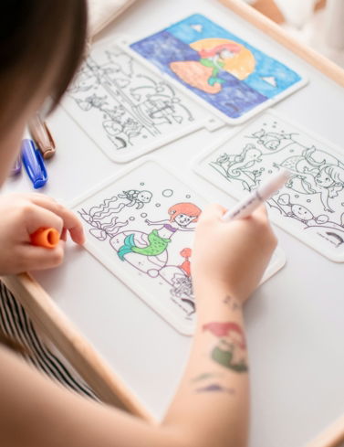 person-drawing-on-white-paper.jpg person drawing on white paper